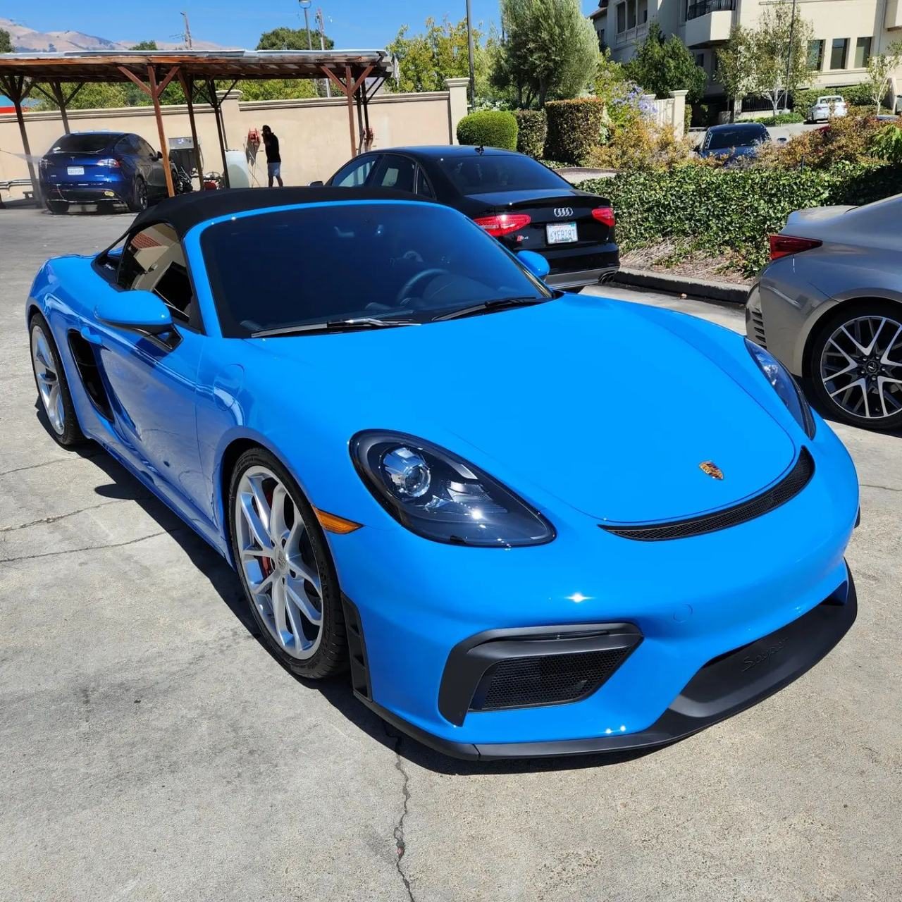 Bright blue Porsche 718 Spyder at 68 Auto Film in Milpitas