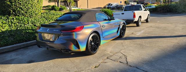 BMW Z4 with color-shift wrap parked outside 68 Auto Film