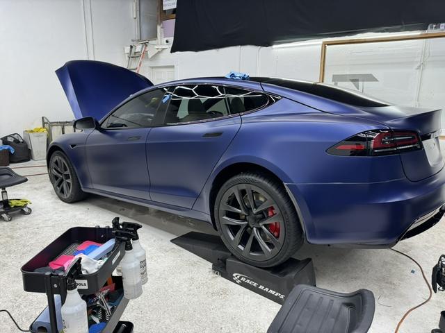 Matte blue Tesla Model S in the 68 Auto Film bay