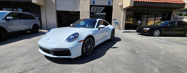 White Porsche 911 outside 68 Auto Film in Milpitas