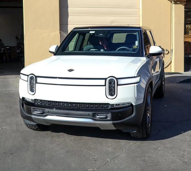 White Rivian R1S front view at 68 Auto Film